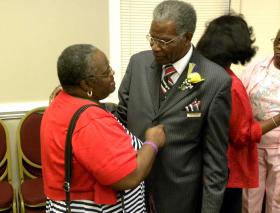  Rev. Matthew Southall Brown Sr., mingling with the waves of guests who recently celebrated his new book