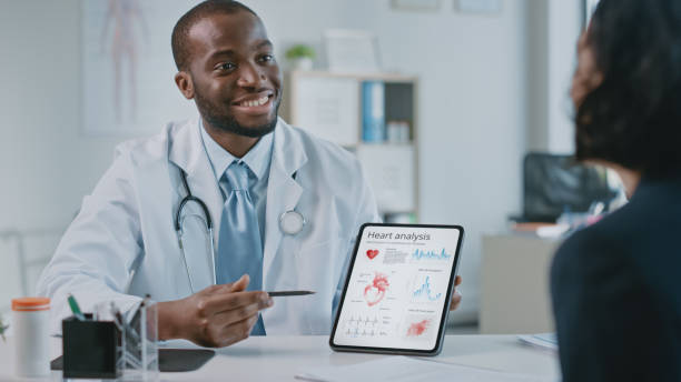 Doctor showing illustration to patient