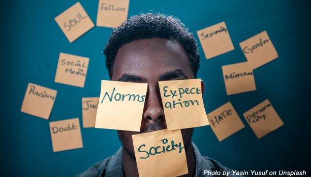 man with post-it notes detailing worries