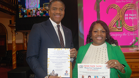Pastor Lawrence Aker III and First Lady Cynthia Aker of Cornerstone Baptist Church with their copy of 'Immunize Now!'